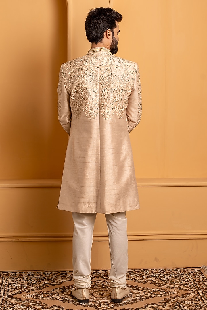 Rose Gold Raw Silk Resham Handwork Groom Sherwani Set by Dev Kumar at Pernia's Pop Up Shop