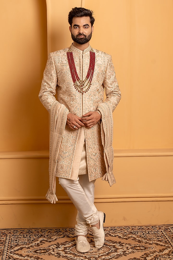 Rose Gold Raw Silk Resham Handwork Groom Sherwani Set by Dev Kumar at Pernia's Pop Up Shop