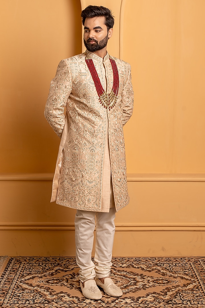 Rose Gold Raw Silk Resham Handwork Groom Sherwani Set by Dev Kumar at Pernia's Pop Up Shop