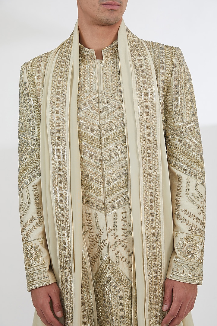 Gold Raw Silk Sequins & Pearl Hand Embroidered Groom Sherwani Set by Dev Kumar at Pernia's Pop Up Shop
