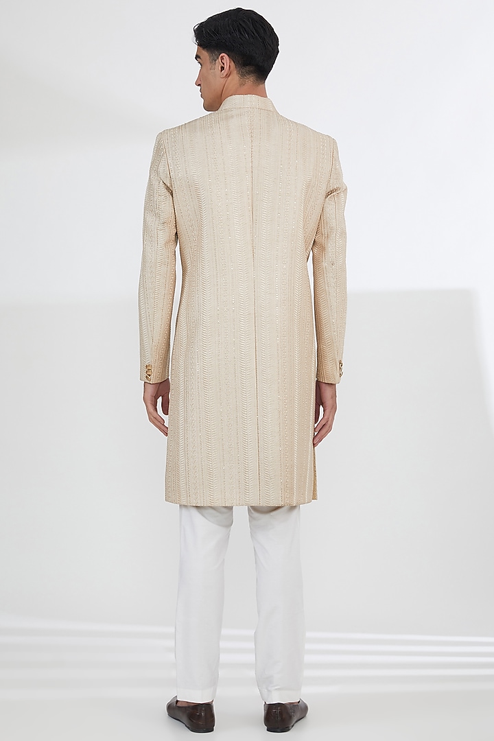 Champagne Gold Raw Silk Sequins & Resham Embroidered Groom Sherwani Set by Dev Kumar at Pernia's Pop Up Shop
