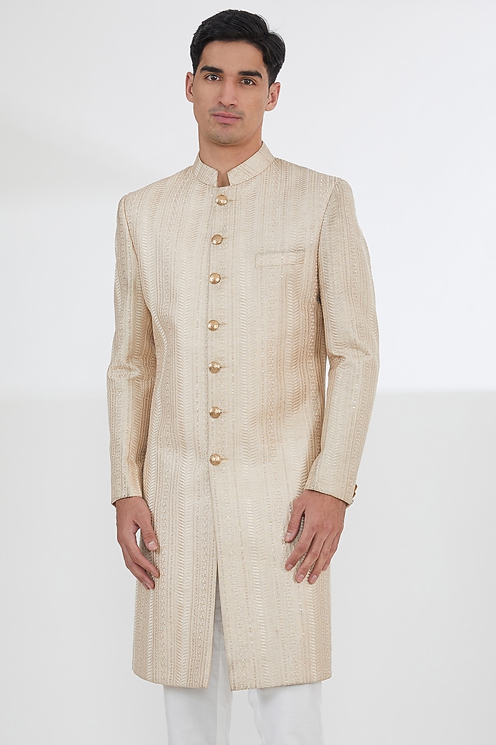 Champagne Gold Raw Silk Sequins & Resham Embroidered Groom Sherwani Set by Dev Kumar at Pernia's Pop Up Shop