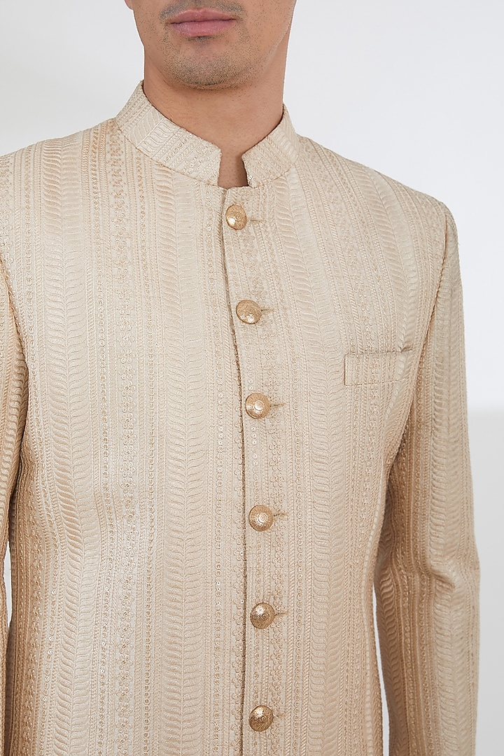 Champagne Gold Raw Silk Sequins & Resham Embroidered Groom Sherwani Set by Dev Kumar at Pernia's Pop Up Shop