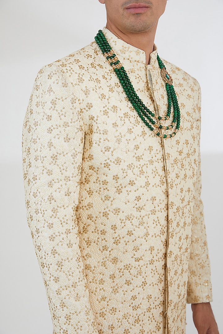 Beige Raw Silk Sequins & Resham Embroidered Groom Sherwani Set by Dev Kumar at Pernia's Pop Up Shop