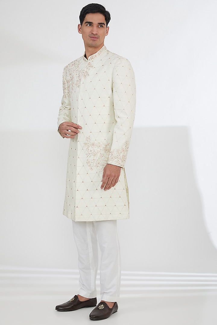 Ivory Raw Silk Sequins & Resham Embroidered Groom Sherwani Set by Dev Kumar at Pernia's Pop Up Shop
