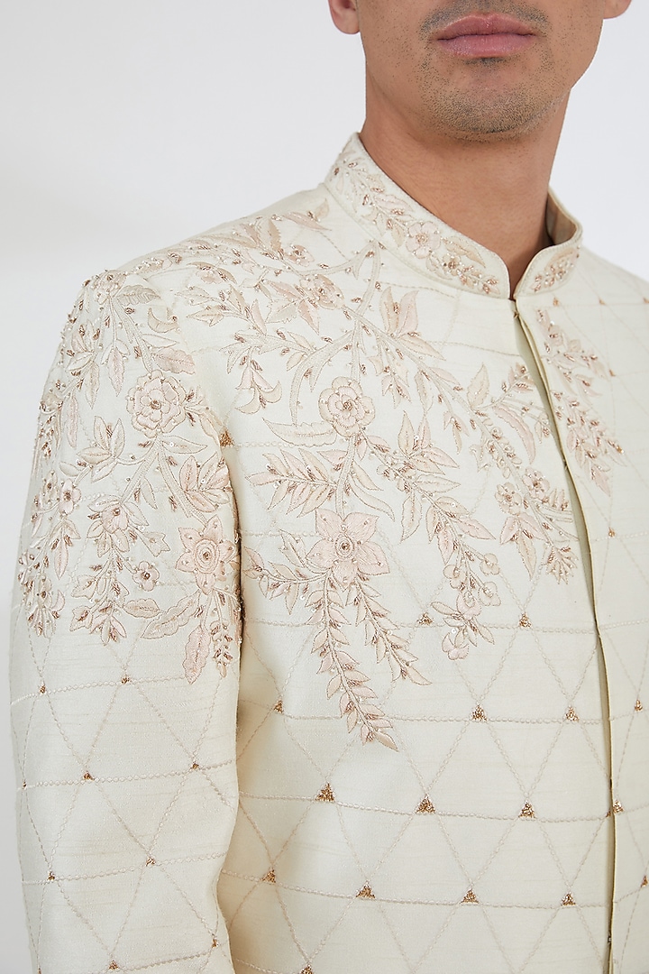 Ivory Raw Silk Sequins & Resham Embroidered Groom Sherwani Set by Dev Kumar at Pernia's Pop Up Shop