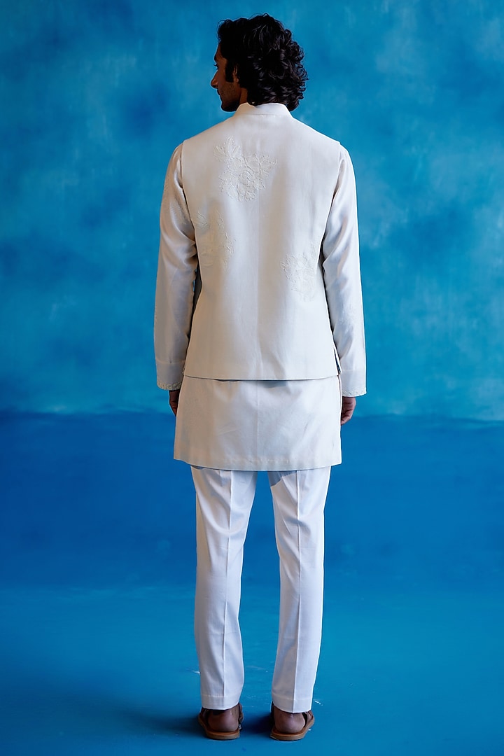 Ivory Silk Chanderi Thread Embroidered Bundi Jacket Set by Devnaagri Men at Pernia's Pop Up Shop