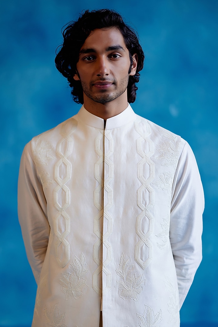 Ivory Silk Chanderi Thread Embroidered Bundi Jacket Set by Devnaagri Men at Pernia's Pop Up Shop