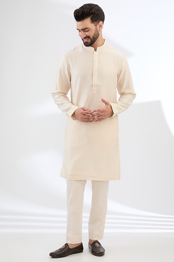 Ivory & Red Tussar Linen Hand Painted Bundi Jacket Set by Devnaagri Men at Pernia's Pop Up Shop