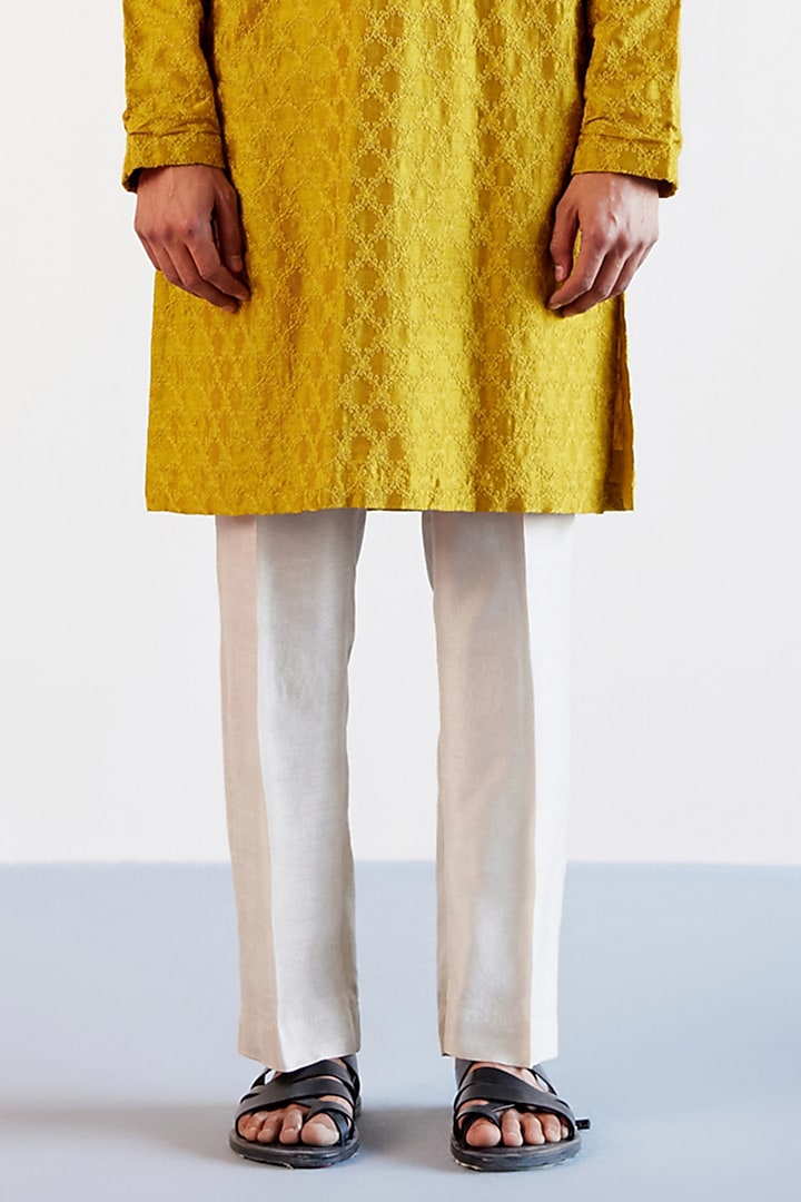Mustard Silk Chanderi Textured Kurta Set by Devnaagri Men at Pernia's Pop Up Shop