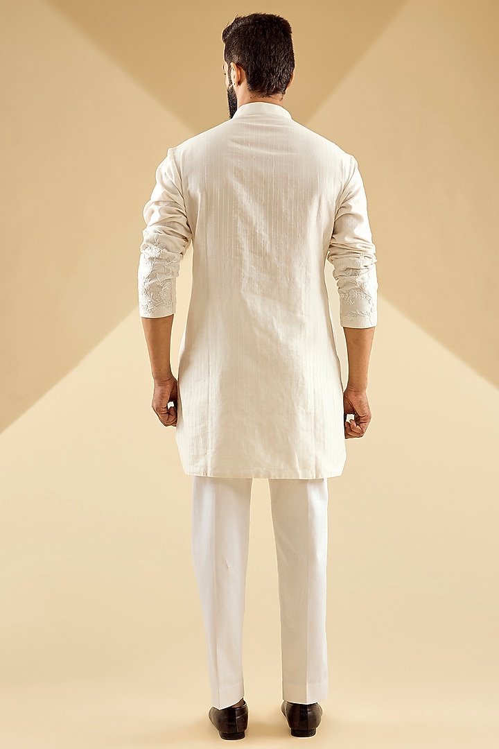 Ivory Raw Silk Kurta Set by Devnaagri Men at Pernia's Pop Up Shop