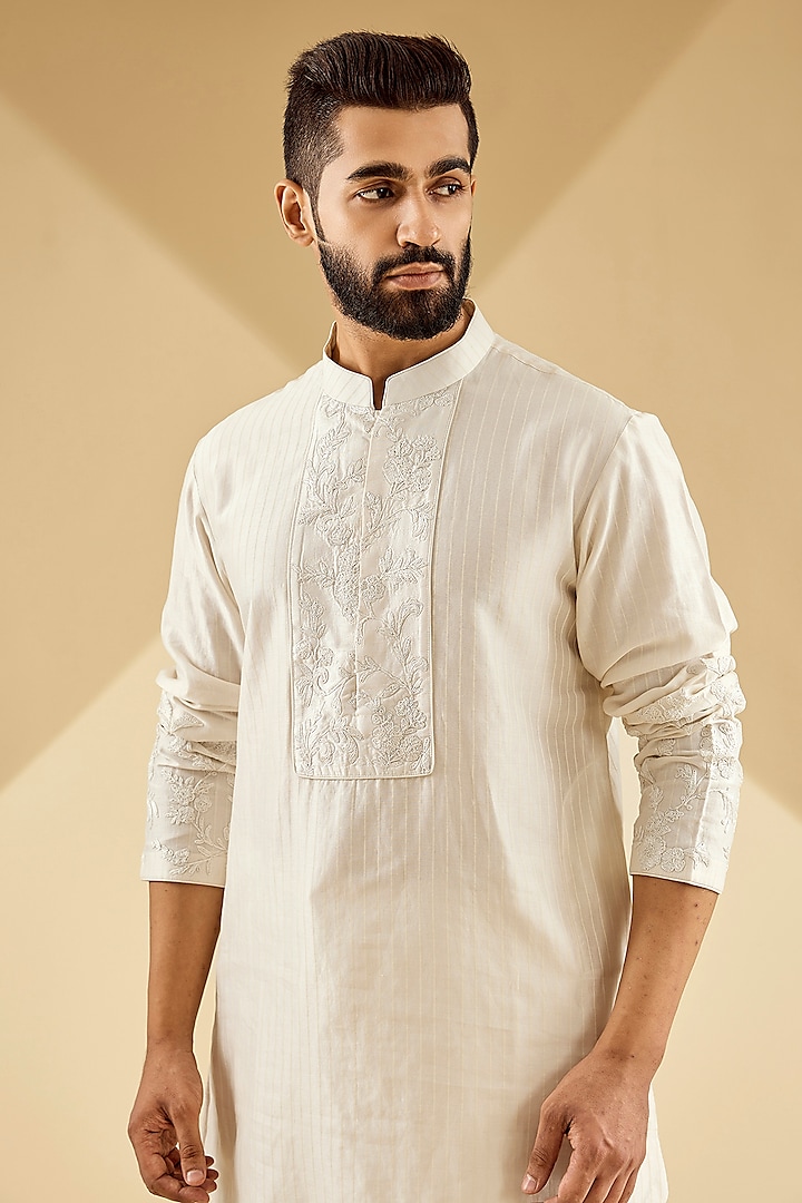 Ivory Raw Silk Kurta Set by Devnaagri Men at Pernia's Pop Up Shop