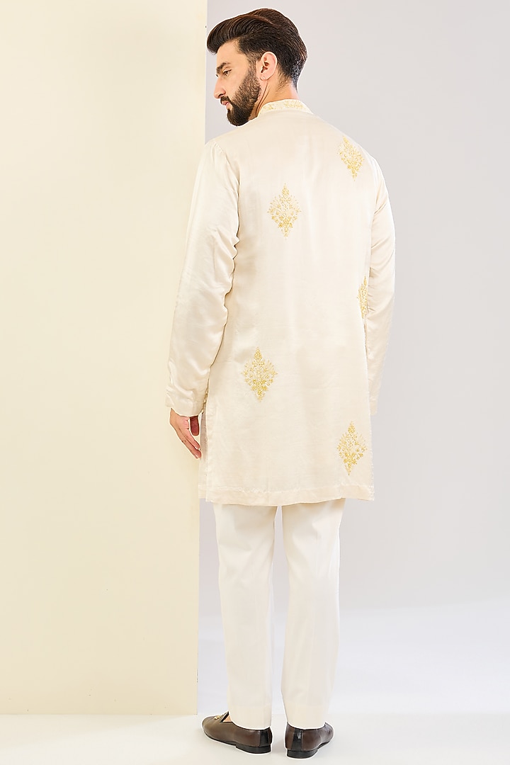 Ivory Silk Satin Dori Embroidered Kurta Set by Devnaagri Men at Pernia's Pop Up Shop