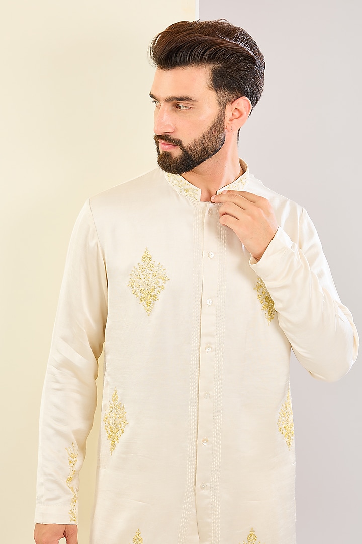 Ivory Silk Satin Dori Embroidered Kurta Set by Devnaagri Men at Pernia's Pop Up Shop