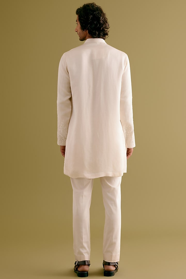Ivory Silk Satin Dori Embroidered Kurta Set by Devnaagri Men at Pernia's Pop Up Shop