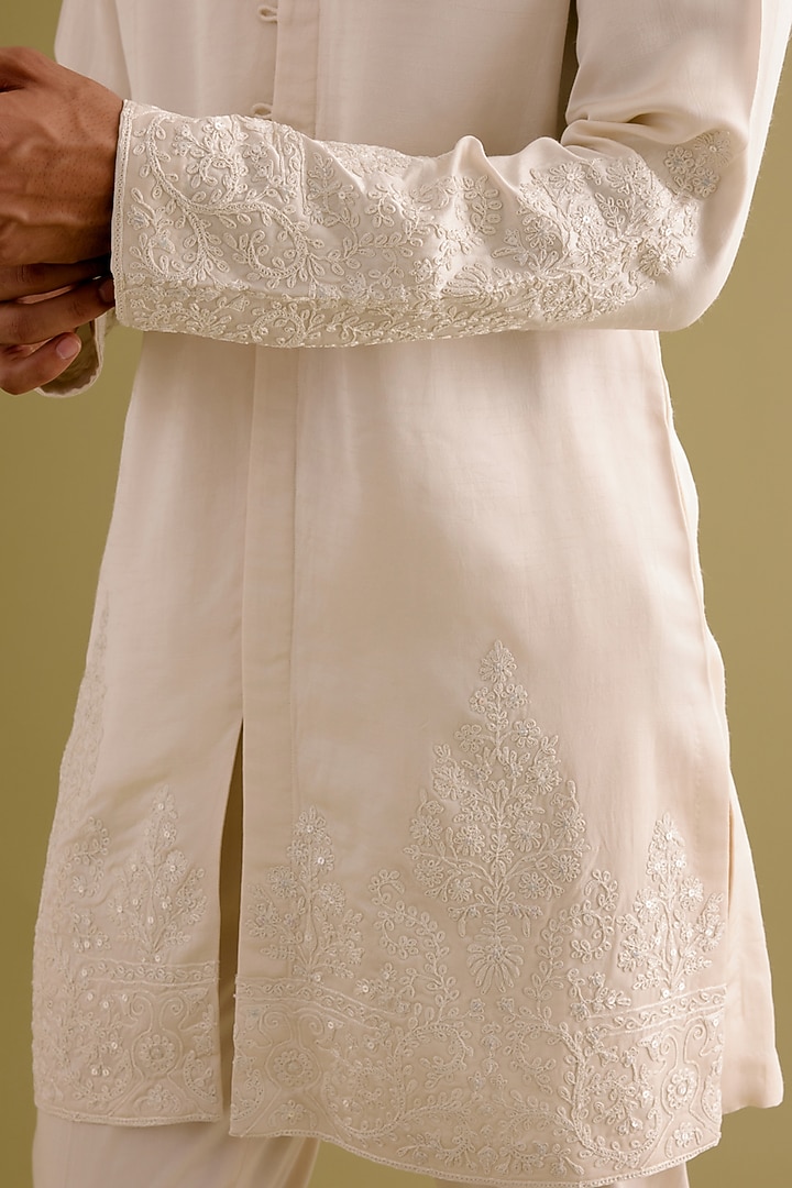 Ivory Silk Satin Dori Embroidered Kurta Set by Devnaagri Men at Pernia's Pop Up Shop
