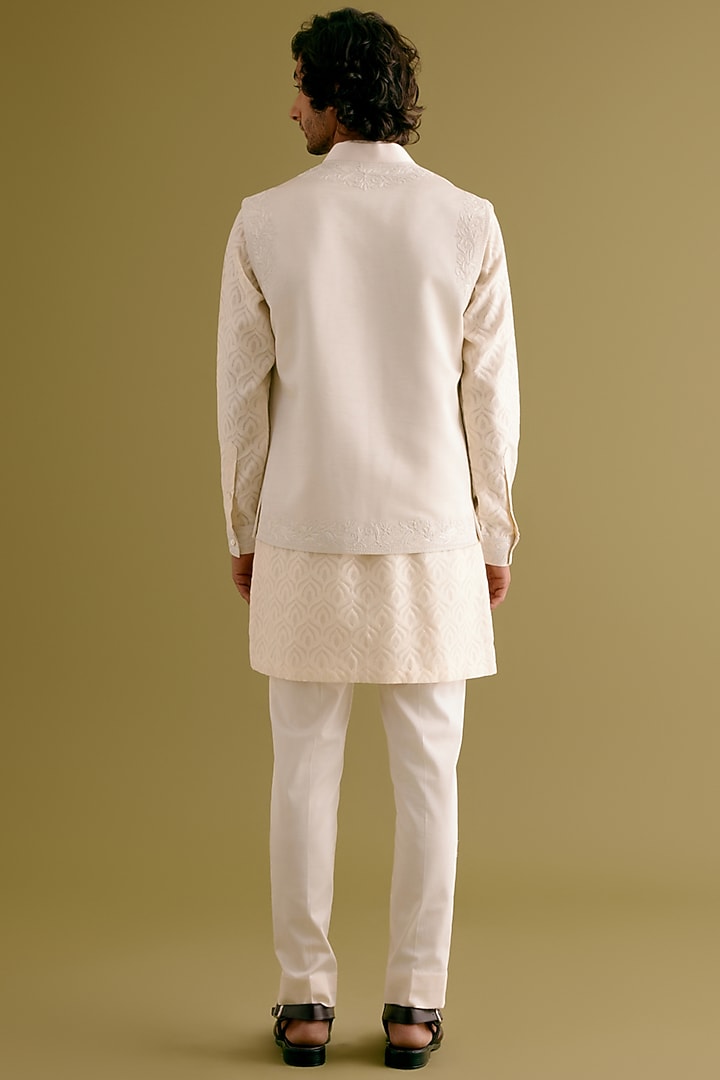 Ivory Silk Satin Dori Embroidered Bundi Jacket Set by Devnaagri Men at Pernia's Pop Up Shop