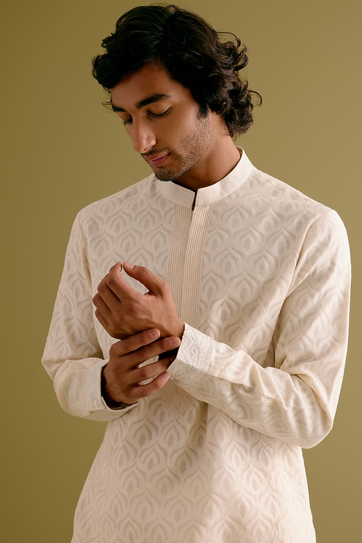 Ivory Silk Satin Dori Embroidered Bundi Jacket Set by Devnaagri Men at Pernia's Pop Up Shop