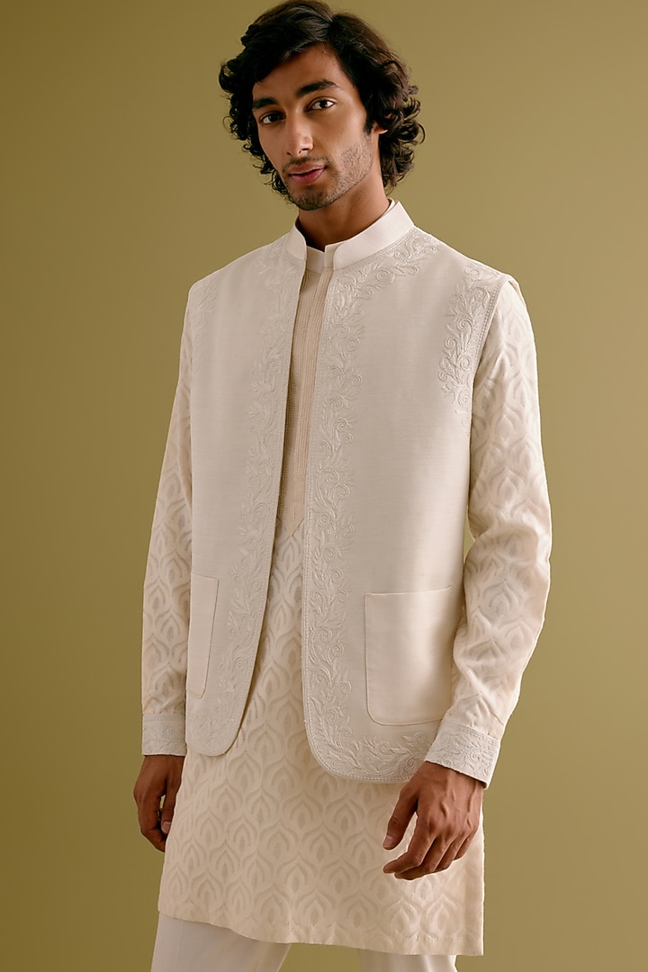 Ivory Silk Satin Dori Embroidered Bundi Jacket Set by Devnaagri Men at Pernia's Pop Up Shop