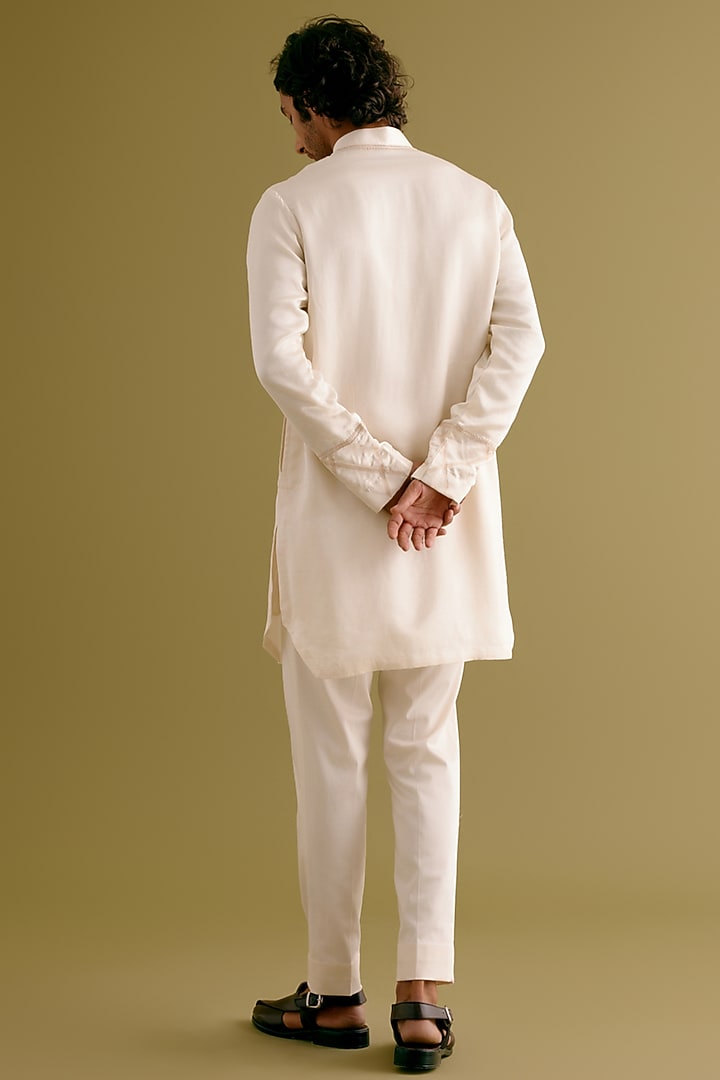 Ivory Silk Satin Dori Embroidered Kurta Set by Devnaagri Men at Pernia's Pop Up Shop