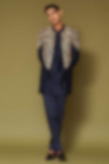 Midnight Navy Blue Linen Satin Dori Embroidered Wedding Bandhgala Set by Devnaagri Men at Pernia's Pop Up Shop