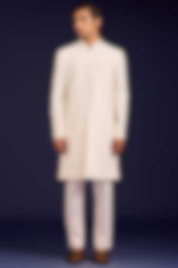 Ivory Cotton Silk Blend Mirror Work Groom Sherwani Set by Devnaagri Men at Pernia's Pop Up Shop