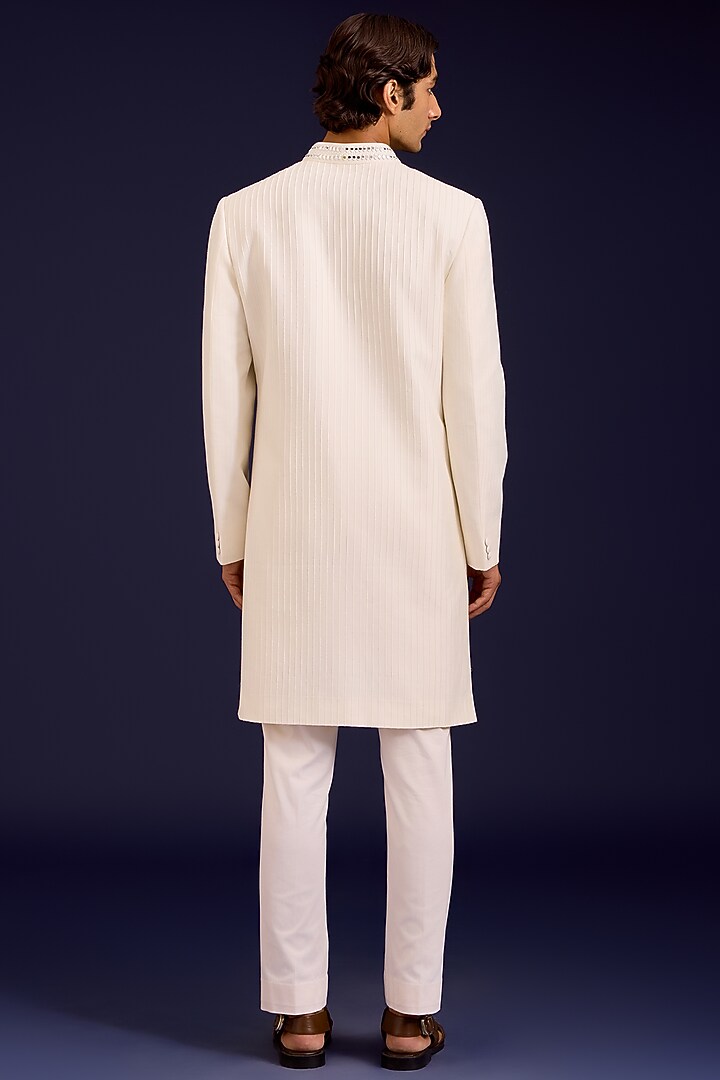Ivory Cotton Silk Blend Mirror Work Groom Sherwani Set by Devnaagri Men at Pernia's Pop Up Shop