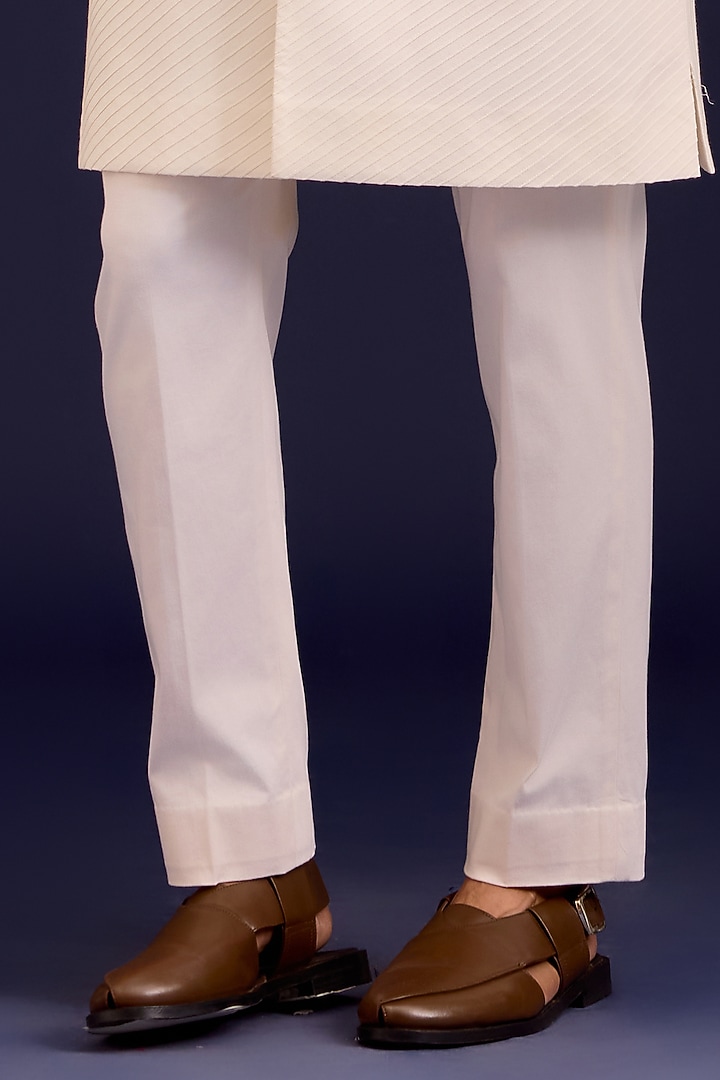 Ivory Cotton Silk Blend Mirror Work Groom Sherwani Set by Devnaagri Men at Pernia's Pop Up Shop