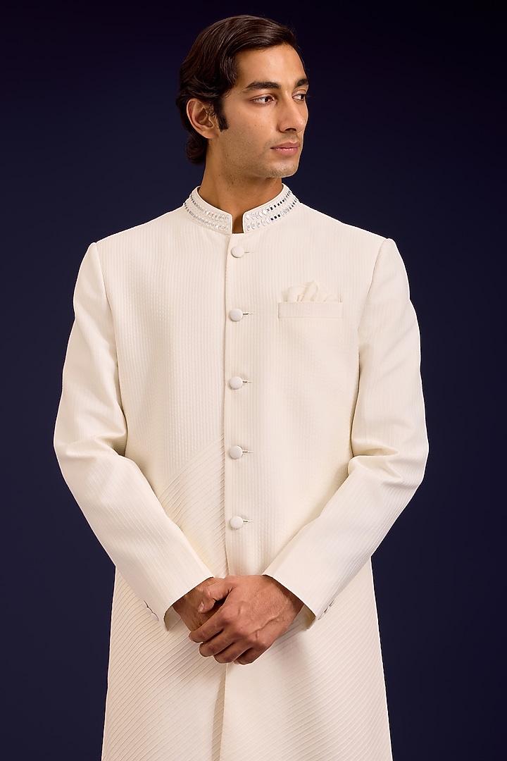 Ivory Cotton Silk Blend Mirror Work Groom Sherwani Set by Devnaagri Men at Pernia's Pop Up Shop