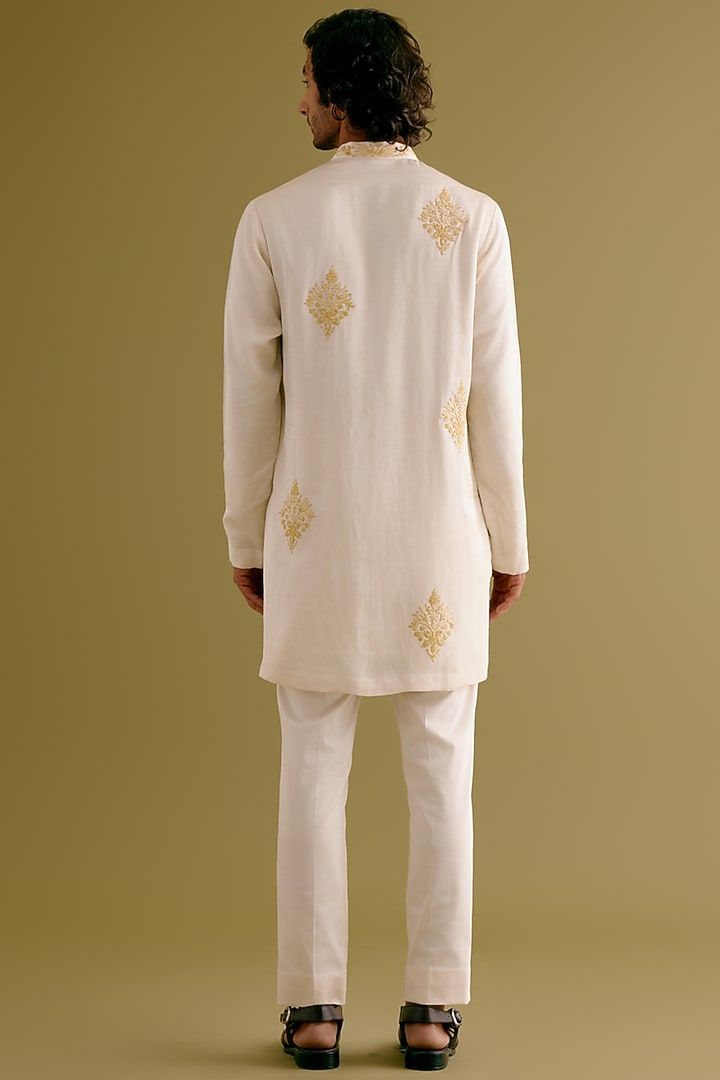 Ivory Silk Satin Dori Embroidered Kurta Set by Devnaagri Men at Pernia's Pop Up Shop