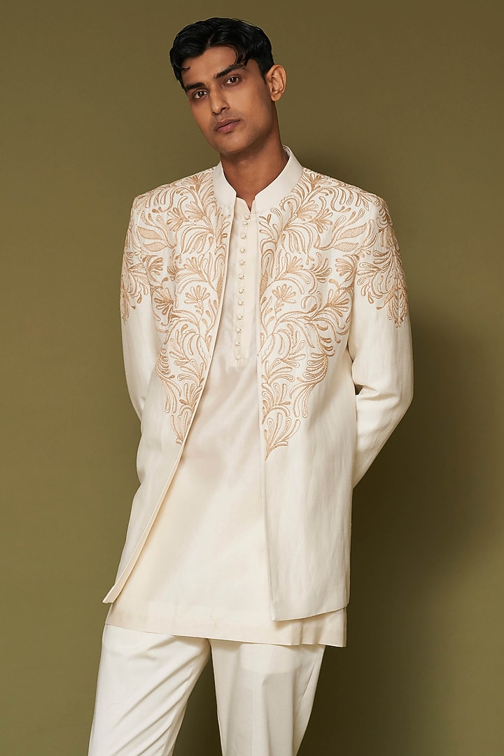 Ivory Linen Satin Dori Embroidered Wedding Bandhgala Set by Devnaagri Men at Pernia's Pop Up Shop