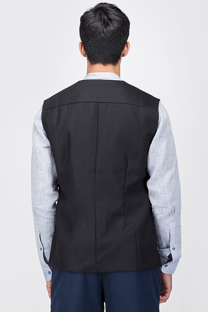 Black Fine Merino Wool Asymmetrical Waistcoat by Dhatu Design Studio at Pernia's Pop Up Shop