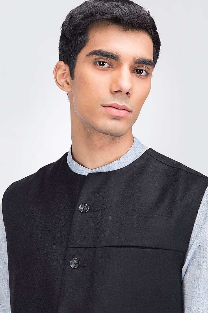 Black Fine Merino Wool Asymmetrical Waistcoat by Dhatu Design Studio at Pernia's Pop Up Shop