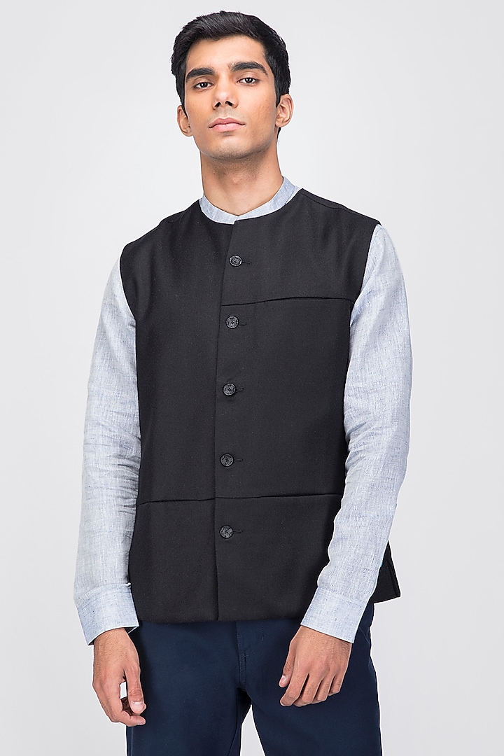Black Fine Merino Wool Asymmetrical Waistcoat by Dhatu Design Studio at Pernia's Pop Up Shop