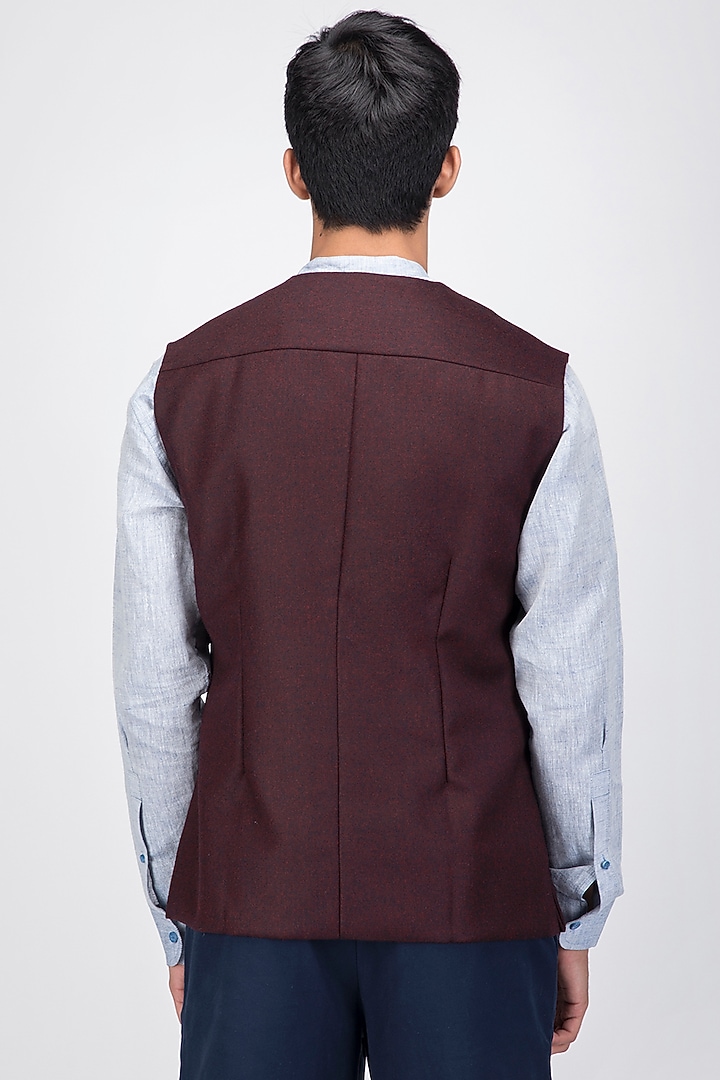 Maroon Fine Merino Wool Asymmetrical Waistcoat by Dhatu Design Studio at Pernia's Pop Up Shop
