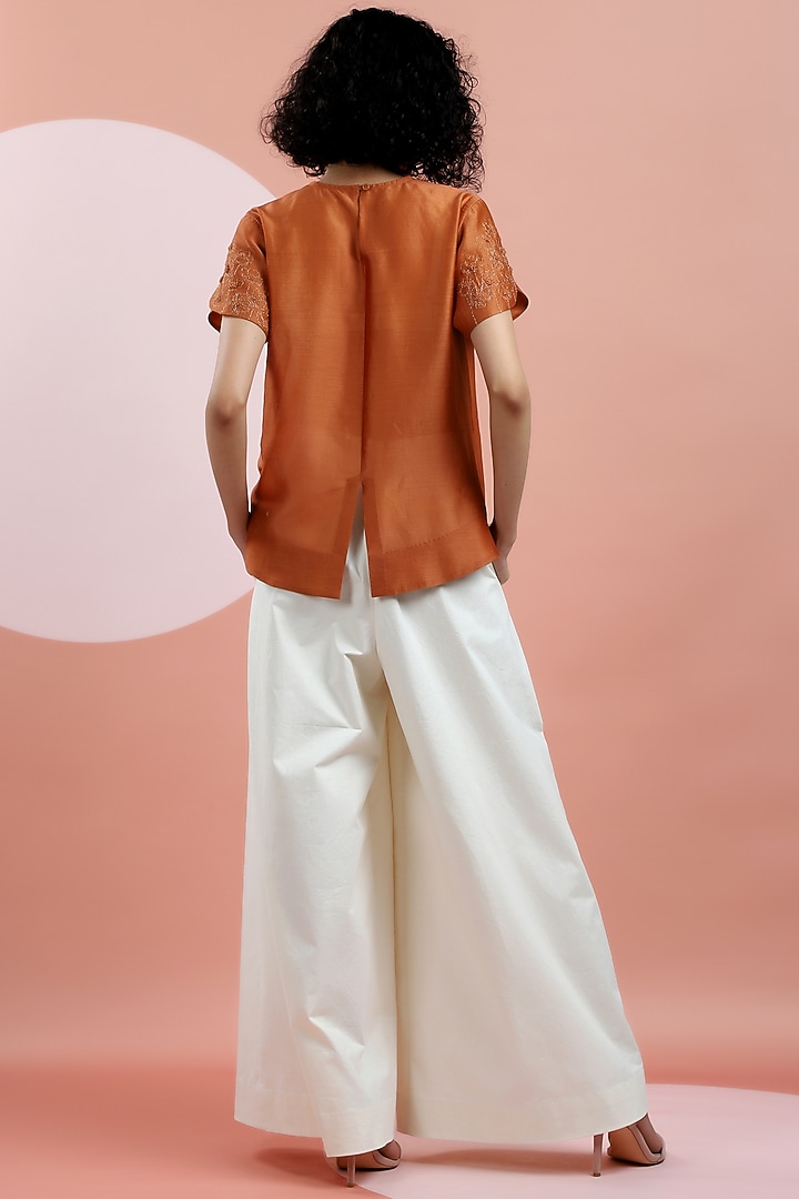 Rust Orange Embroidered T-shirt by DHI at Pernia's Pop Up Shop