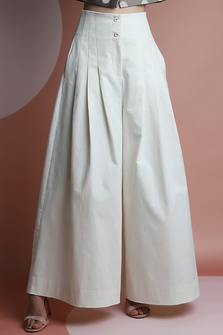 Ceramic White Cotton Twill Flared Pants by DHI at Pernia's Pop Up Shop