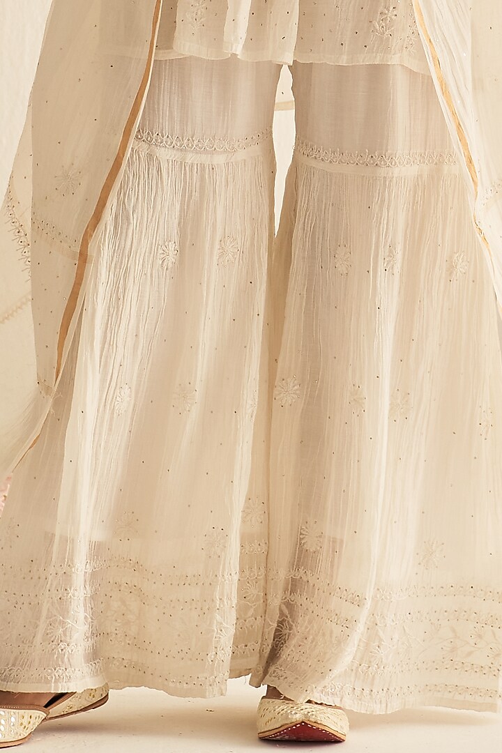 White Mul Chanderi Embroidered Party Wear Sharara Set by Dhaaga & Co. by Savnit Gurnani at Pernia's Pop Up Shop