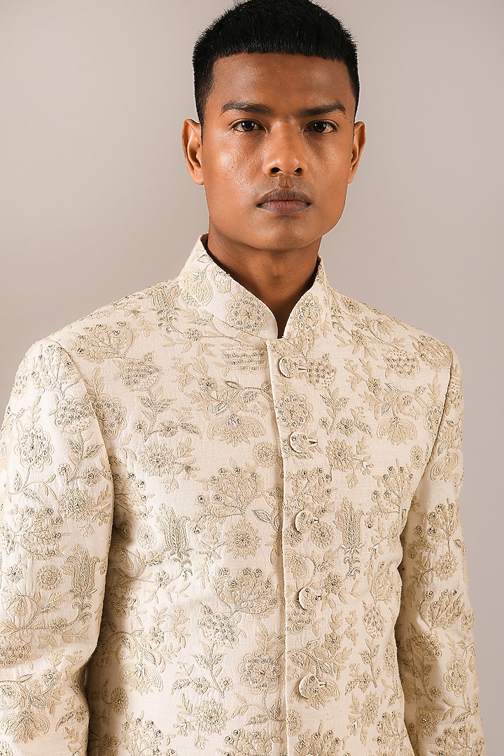Cream Silk Embroidered Groom Sherwani Set by Dhruv Vaish at Pernia's Pop Up Shop