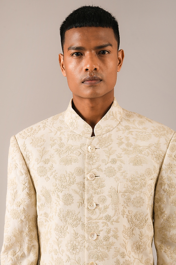 Cream Silk Embroidered Groom Sherwani Set by Dhruv Vaish at Pernia's Pop Up Shop