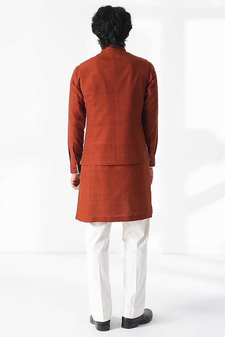 Burnt Orange Matka Silk Thread Embroidered Kurta by Dhruv Vaish at Pernia's Pop Up Shop