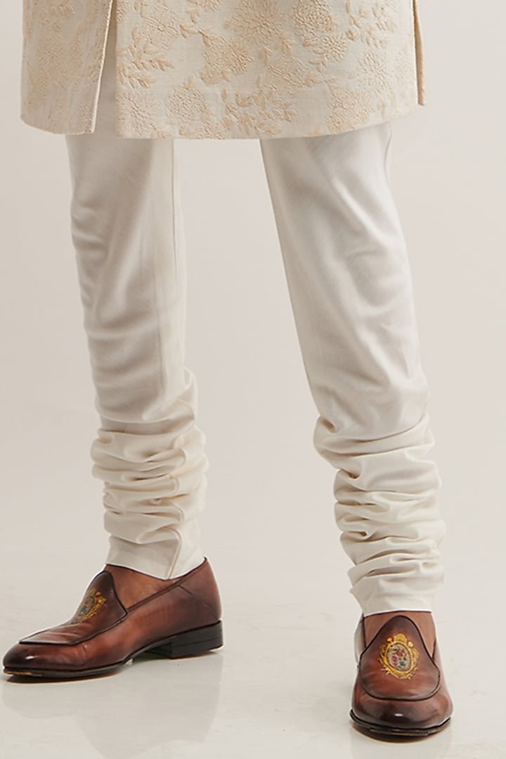 Cream Silk Embroidered Groom Sherwani Set by Dhruv Vaish at Pernia's Pop Up Shop