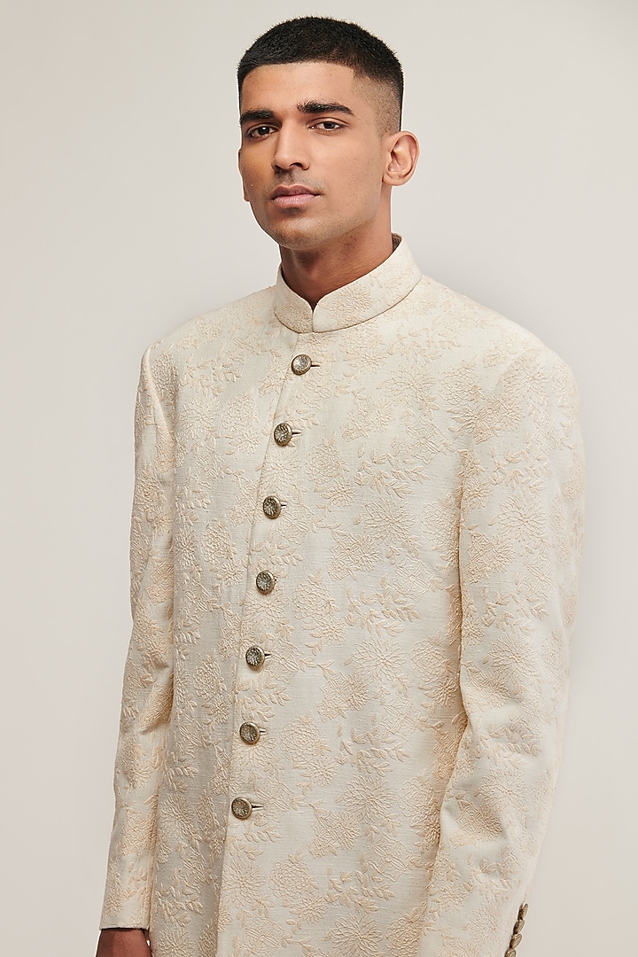 Cream Silk Embroidered Groom Sherwani Set by Dhruv Vaish at Pernia's Pop Up Shop