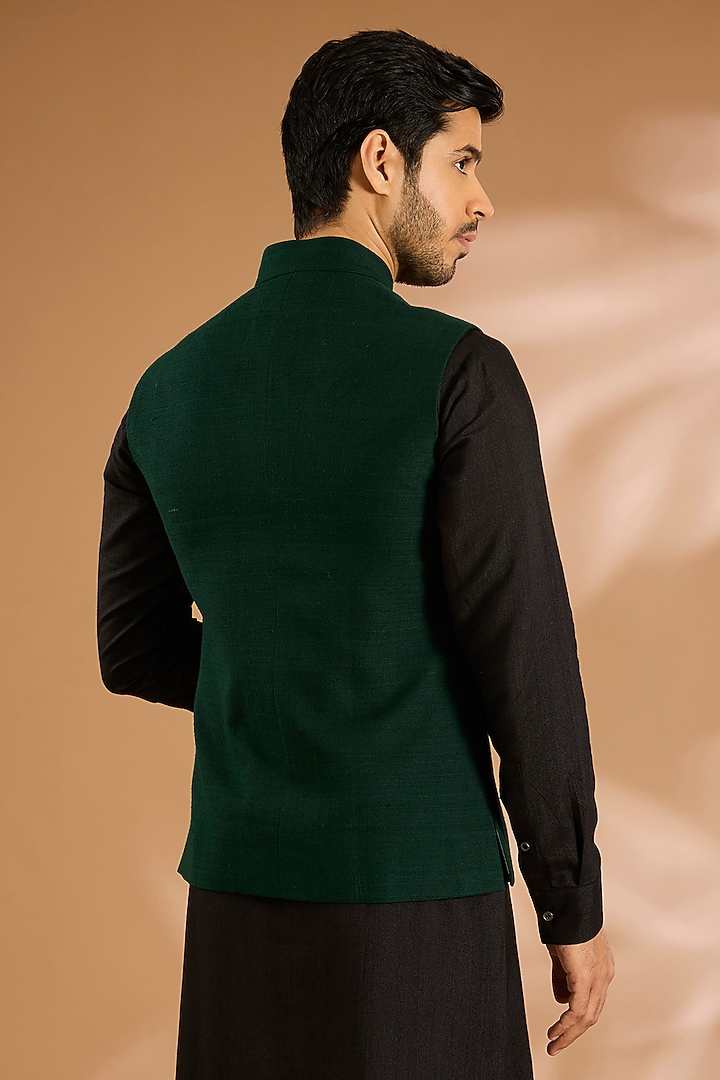 Bottle Green Silk Bundi Jacket by Dhruv Vaish at Pernia's Pop Up Shop