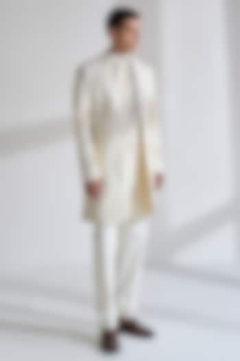 Ivory Silk Thread Embroidered Sherwani Set by Dhruv Vaish