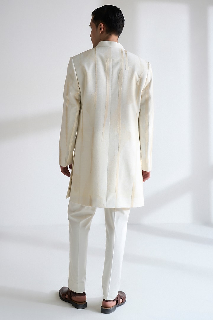 Ivory Silk Thread Embroidered Groom Sherwani Set by Dhruv Vaish at Pernia's Pop Up Shop
