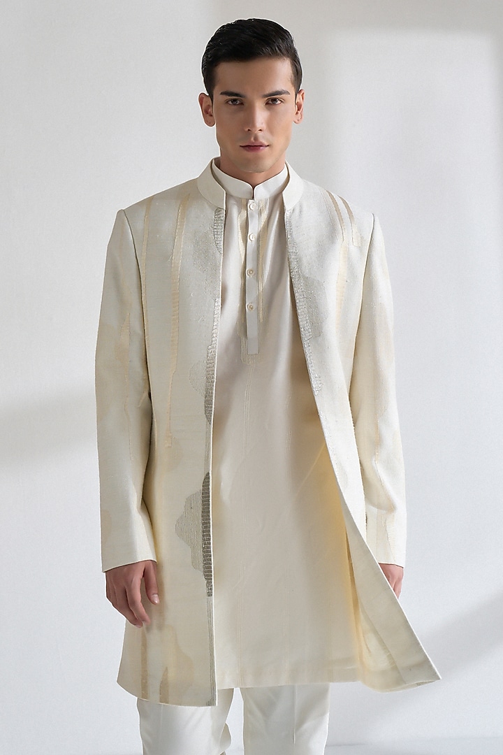 Ivory Silk Thread Embroidered Groom Sherwani Set by Dhruv Vaish at Pernia's Pop Up Shop