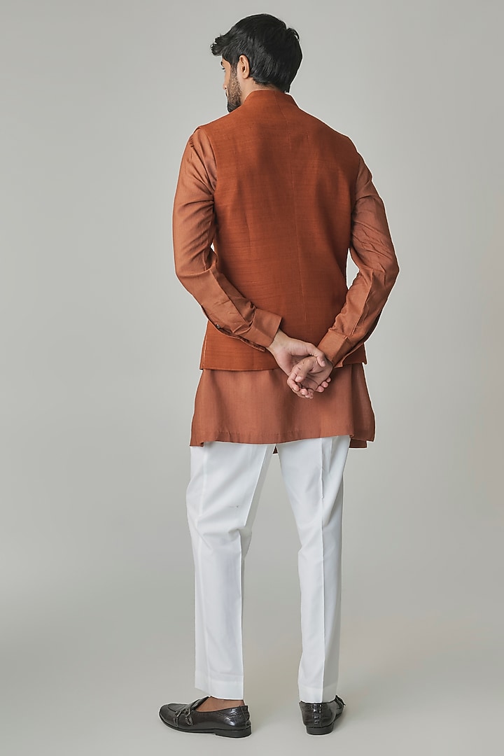 Burnt Orange Silk Bundi Jacket Set by Dhruv Vaish at Pernia's Pop Up Shop