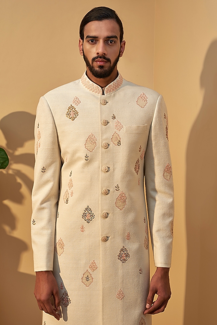 Cream Silk Metal Embroidered Groom Sherwani Set by Dhruv Vaish at Pernia's Pop Up Shop