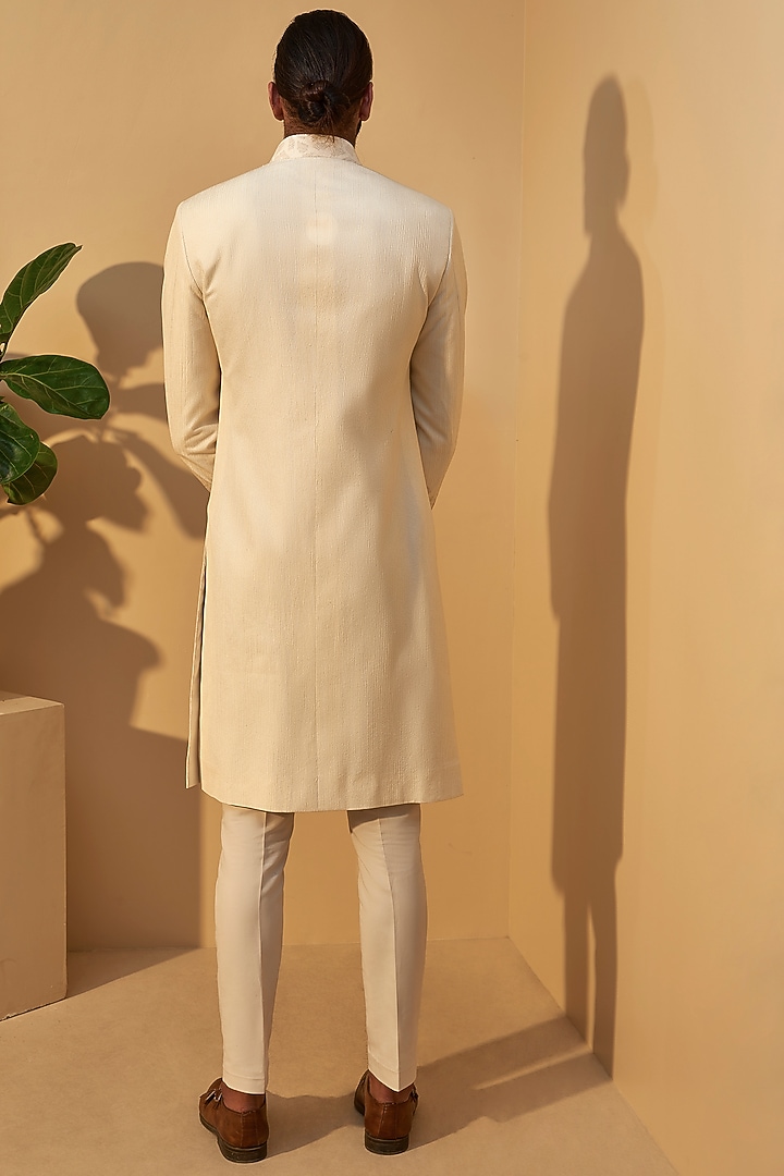 Cream Silk Thread Embroidered Groom Sherwani Set by Dhruv Vaish at Pernia's Pop Up Shop